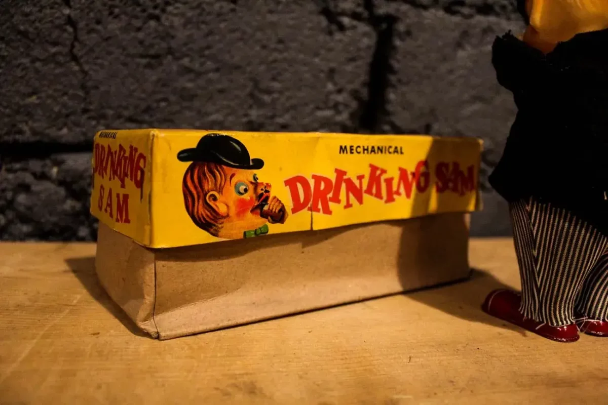 Jouet mécanique Drinking Sam, collection vintage, action buvant.