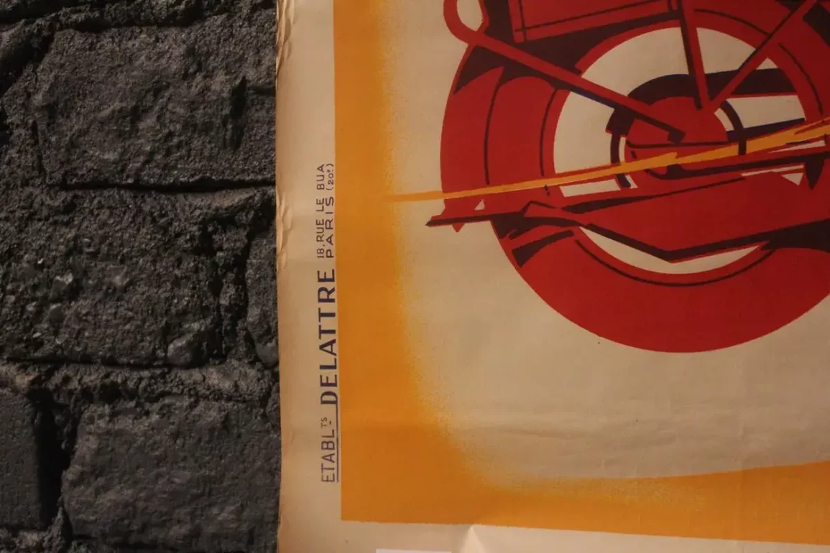 Détail de la signature Etablissement DELATTRE sur l'affiche.