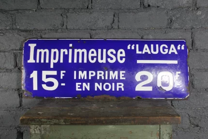 Plaque émaillée "LAUGA" imprimeuse, bleu d'époque.