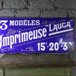 Plaque émaillée "LAUGA" Imprimeuse, années 20.