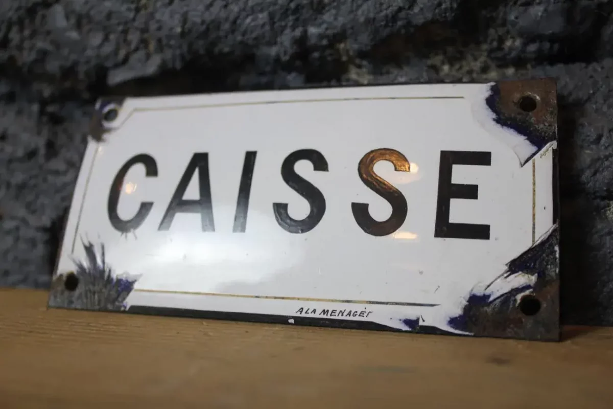Plaque émaillée "CAISSE", patine et couleurs d'origine.